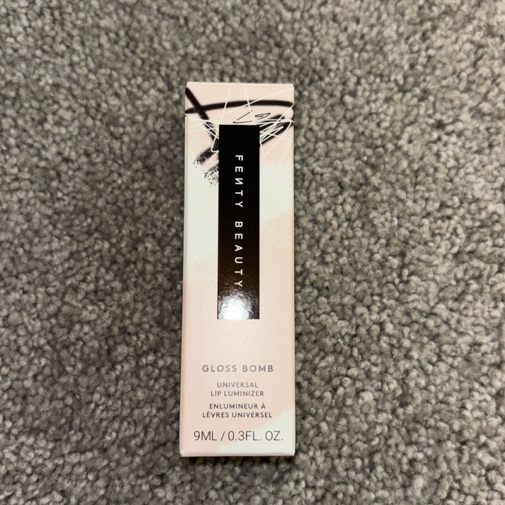 Fenty beauty glass bomb lip luminizer 
Brand new never used, ordered wrong shade